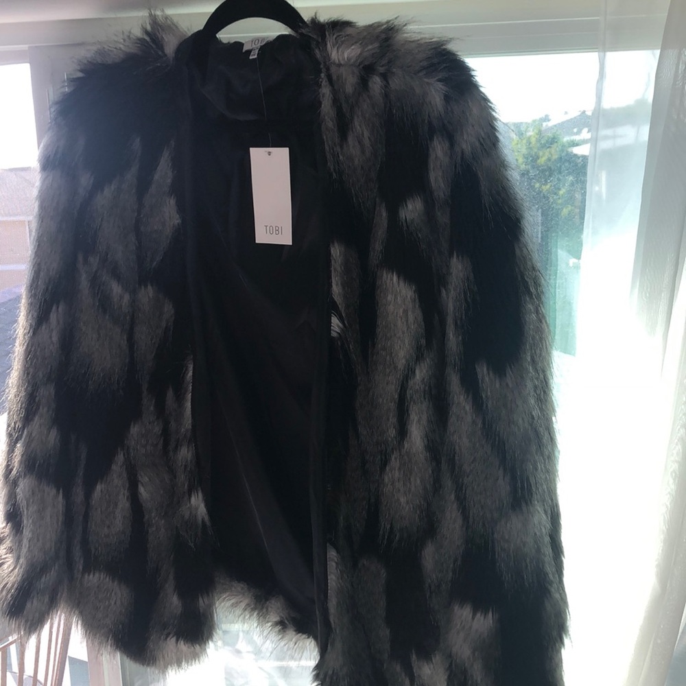 Grey/white/black fur coat